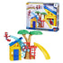 Marvel Spidey playground playset shows bright yellow house, blue slide track, red ladder and tree with green canopy, featuring small Spidey figure posed mid-swing against detailed retail packaging.
