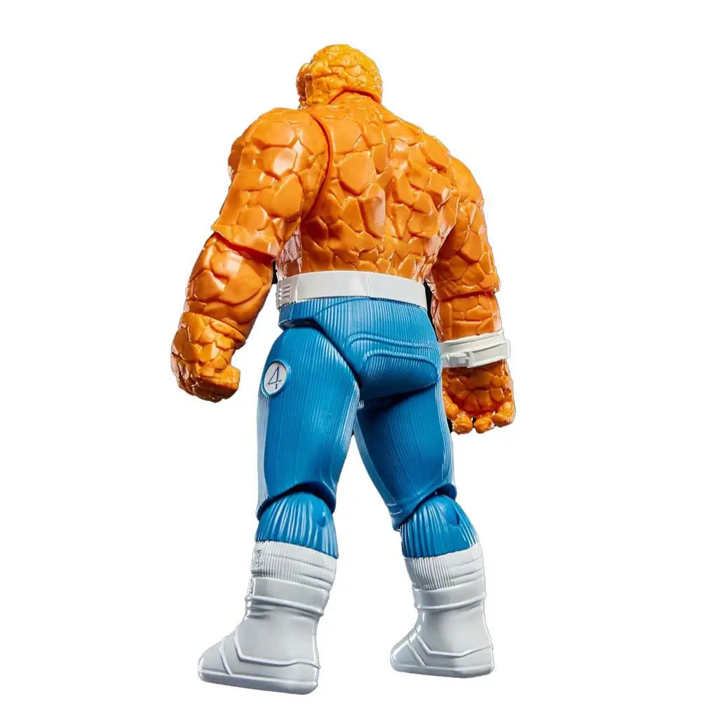 Marvel The Thing action figure rear view, revealing textured orange back, blue pants with Fantastic Four logo on the side and white boots, set against a white studio backdrop.