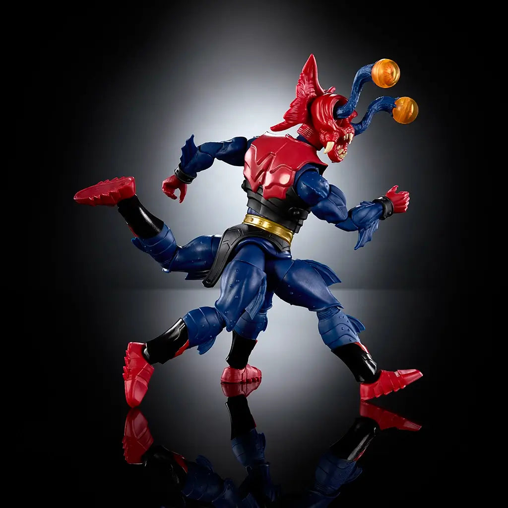 Side view of the Masters of the Universe New Eternia Mantenna action figure showing red armored back, blue muscular limbs, insect-like head profile, articulated legs, and balanced stance highlighted against a dark reflective background.