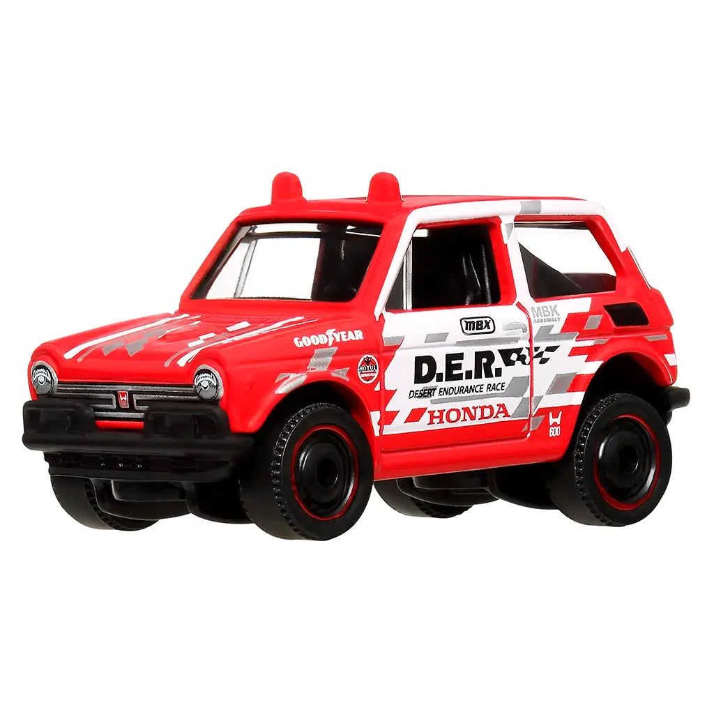 Front angled view of red and white Matchbox Honda N600 off-road die-cast car, featuring rally decals, rugged tires, and realistic headlights for collectors and enthusiasts.