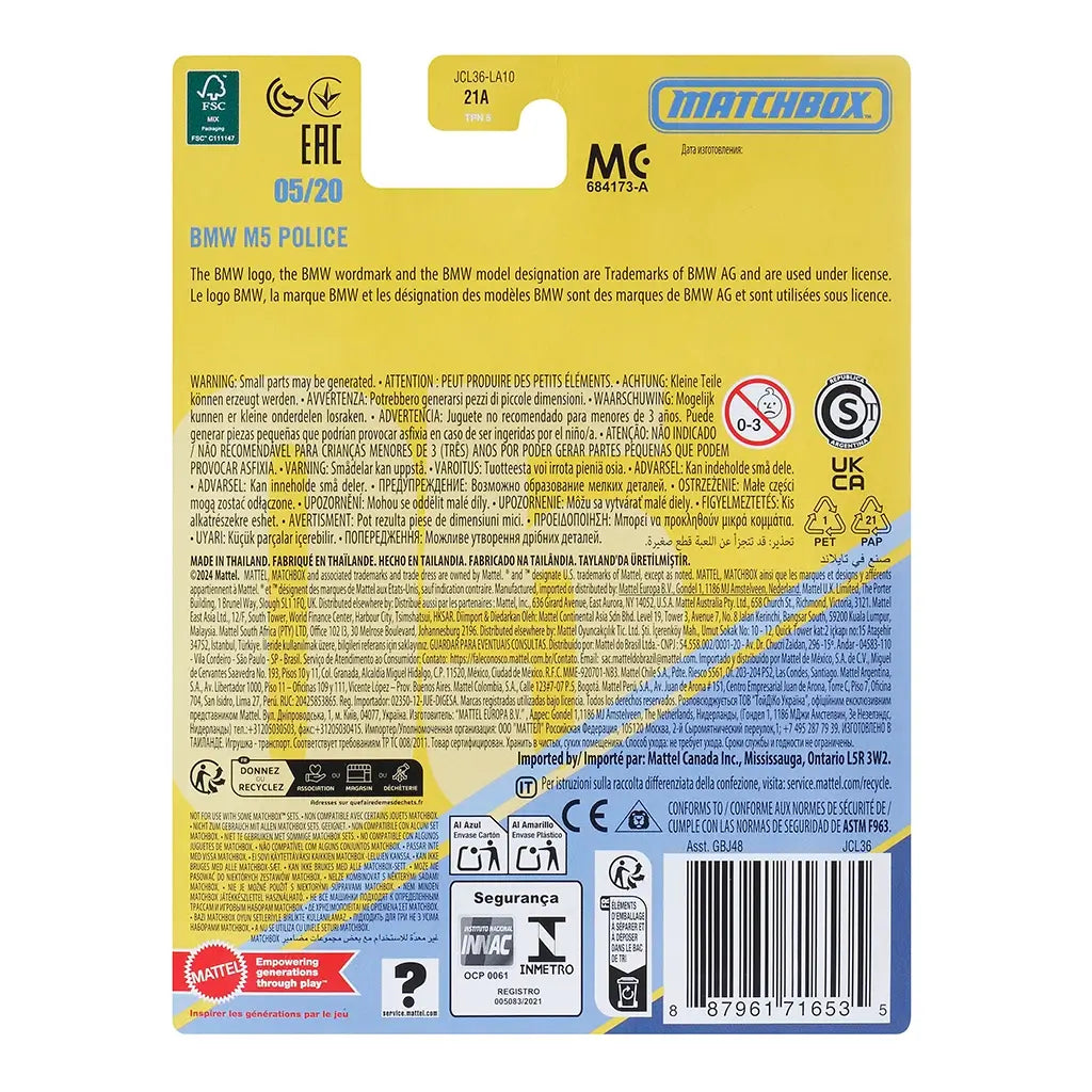 Rear packaging of Matchbox BMW M5 Police 1:64 model with yellow background, multilingual warnings, barcode, recycling icons, and licensing details printed clearly.