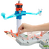 Matchbox Airport Takeoff Adventure runway set showing a rotating blue tower arm with an orange airplane held by hand, ready to taxi across the molded gray runway.