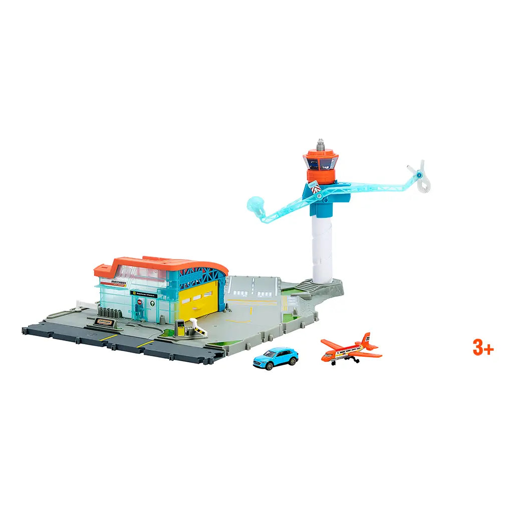 Complete Matchbox Airport Takeoff Adventure playset including a gray runway, red-roofed terminal, blue and orange control tower, blue car, and orange airplane.
