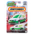 Matchbox Volkswagen Caddy Delivery toy van in white and green with Caramel Apple Pops logo, packaged on a colorful candy-themed backing card with lollipops and sweets.
