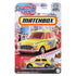 Matchbox 1964 Austin Mini Cooper toy in yellow with “Charleston Chew” branding, packaged on candy-themed card with colorful sweets and labeled as part of the Candy Collection.