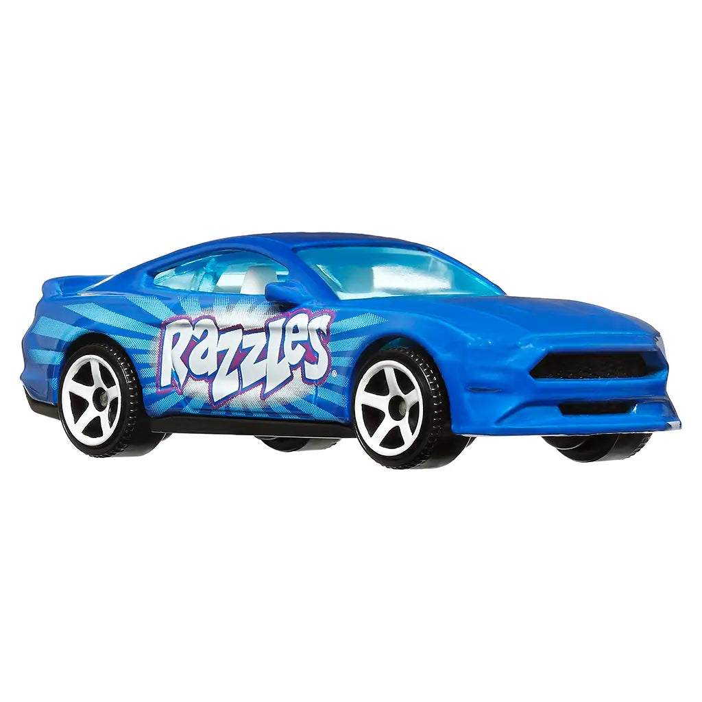 Die-cast Matchbox ’19 Ford Mustang Coupe in bright blue with candy-inspired “Razzles” logo, low-profile coupe shape, black detailing, and sleek racing-style wheels.