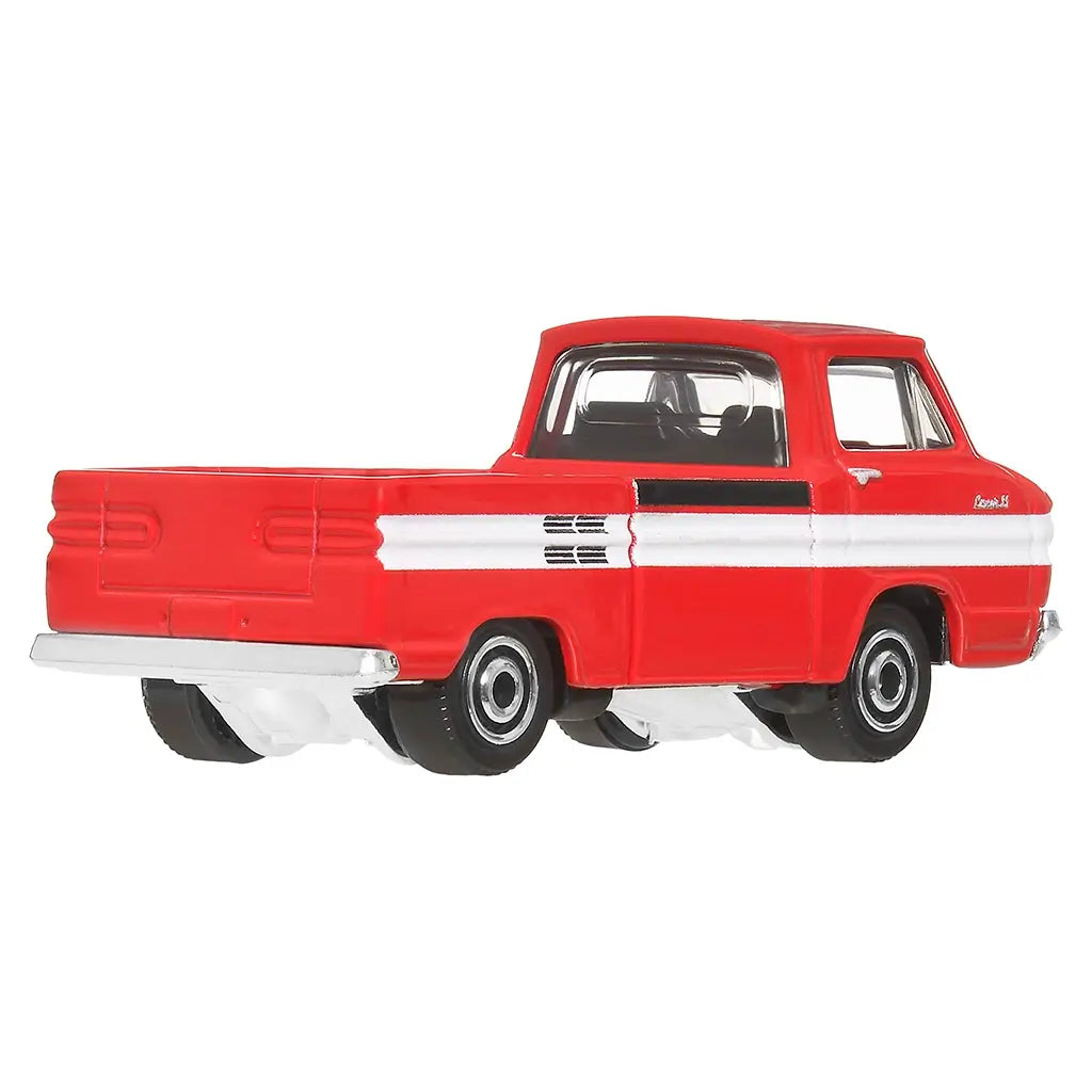 Rear angled view of Matchbox 1961 Chevy Corvair Rampside Pickup in red with white stripe, featuring silver bumpers, molded details, and sturdy build for imaginative vehicle play.