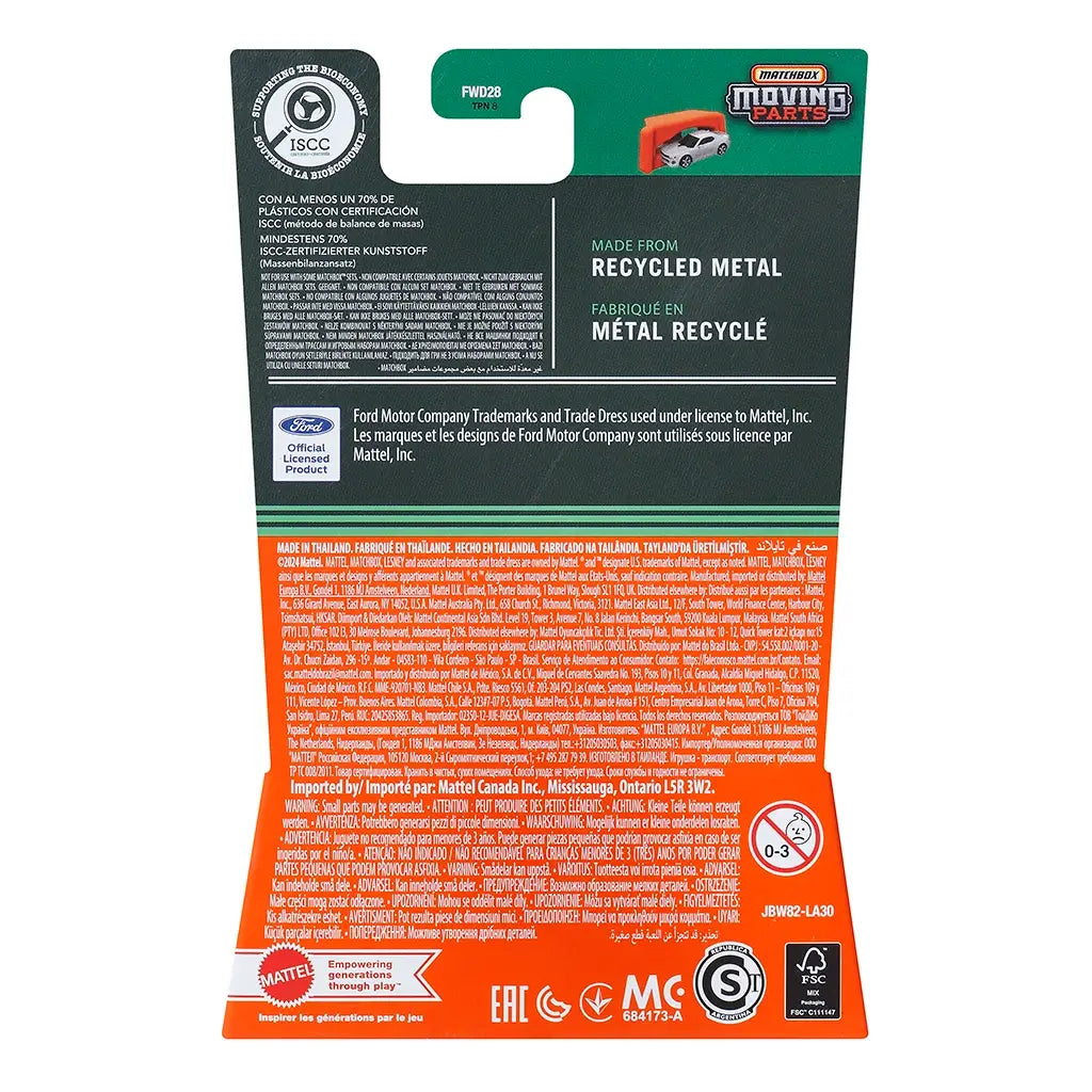 Back view of Matchbox Moving Parts toy packaging with recycling information, licensing details for Ford, and multilingual product text on a green and orange background.