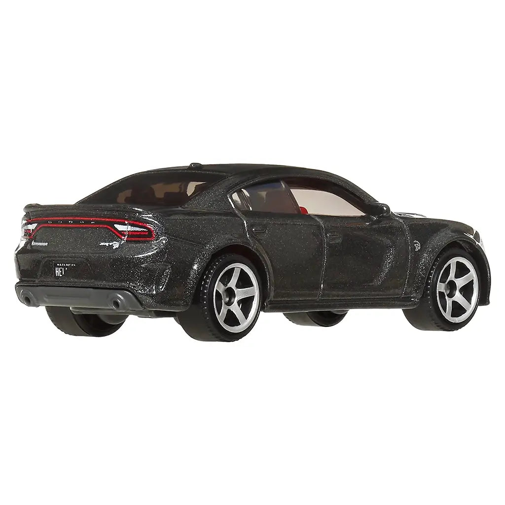Rear view of Matchbox 2020 Dodge Charger SRT Hellcat model in black metallic paint, featuring silver alloy-style wheels, red seats, dual exhaust tips, and sculpted taillights.