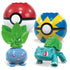 Red, blue, yellow, and green Poké Ball toys with Mega Pokémon building figures of Oddish and Bulbasaur, featuring vibrant blocky details and expressive Pokémon faces.