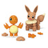 Mega Pokémon Charmander and Eevee building set with small plastic pieces shown on white background, featuring orange Charmander and brown Eevee figures alongside spare block parts.