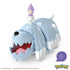 Close-up of assembled Mega Pokémon Greavard figure, showing shaggy light blue fur, open mouth with red interior, and candle flame on top of head. This Mega Construx toy set offers build-and-play fun for Pokémon fans ages six and older, combining display and play features in one collectible set.