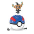 Assembled Mega Pokémon Phantump posed above Great Ball building set, with extra small brick pieces placed beside base for customizable building and display configurations.