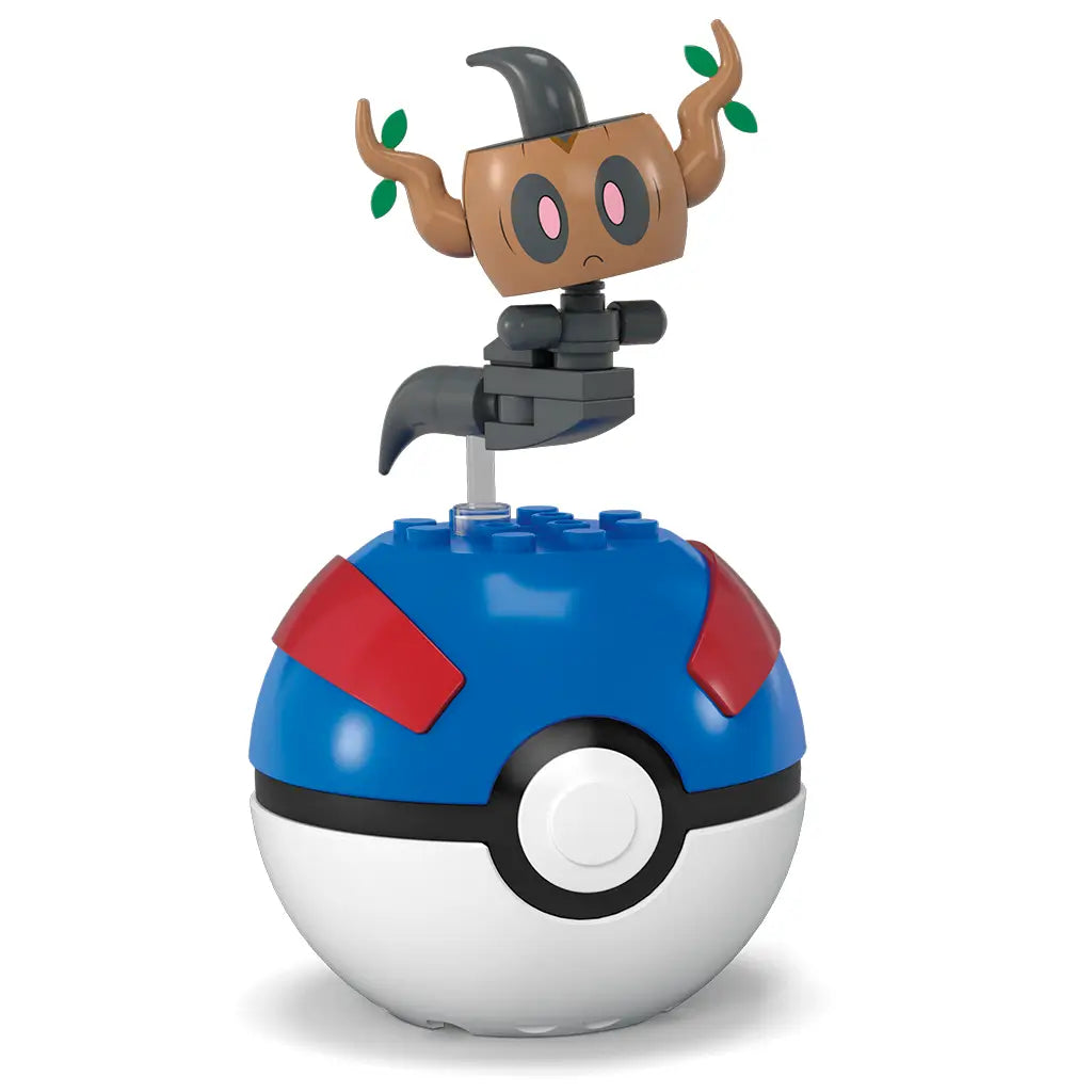 Mega Pokémon Phantump perched on Great Ball brick container, showing brown wooden-style head, black tail-like base, and green leaves on curved branch-like horns for detailed character accuracy.