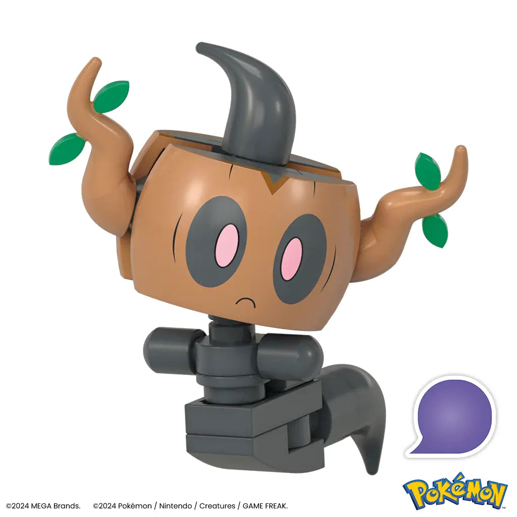 Close-up of assembled Mega Pokémon Phantump figure with brown wooden-textured head, curved black horn, and poseable gray-black block limbs, designed for display or imaginative play.