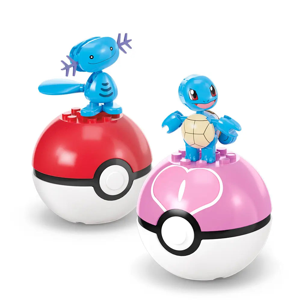 MEGA Construx-style Wooper and Squirtle Pokémon figures standing on red and pink Poké Balls, part of the Water-Type Trainer Team building set designed for kids aged 6 and up.