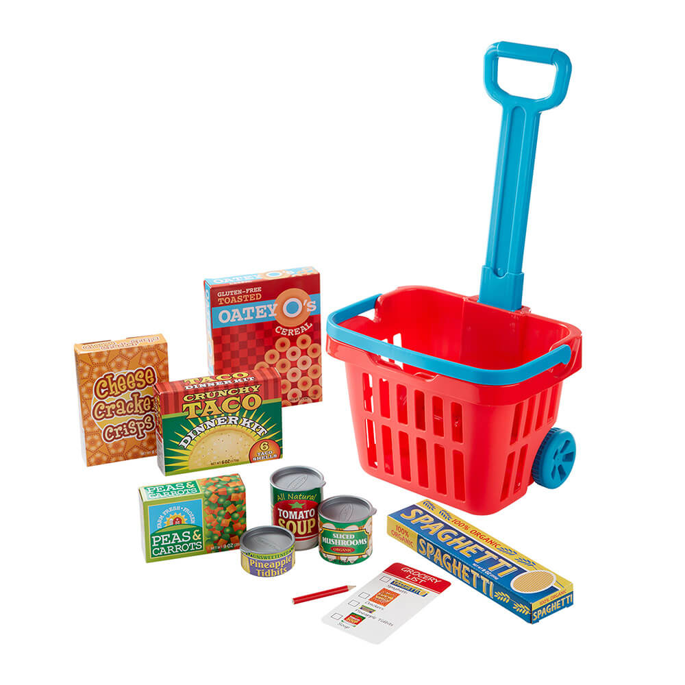 Melissa and Doug Fill & Roll Grocery Basket Play Set features the rolling grocery basket, cereal, crackers, tacos, soup, canned goods, spaghetti, vegetables, shopping list, pencil and more.