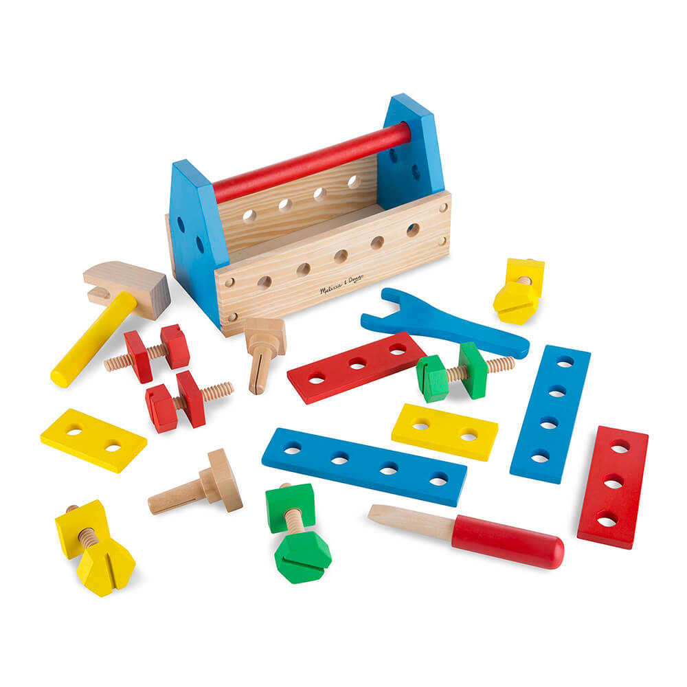 Melissa and Doug Take-Along Tool Kit Wooden Toy with all pieces removed showing you what the set includes