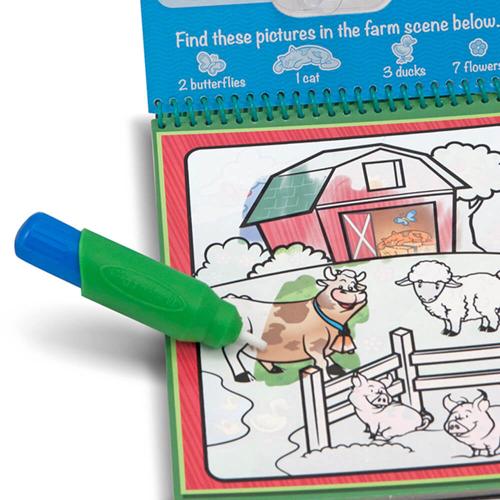 Picture of pen filled with water and coloring on the page with picture changing color of the Melissa and Doug Water Wow! Animals Water-Reveal On the Go Travel Activity Pad