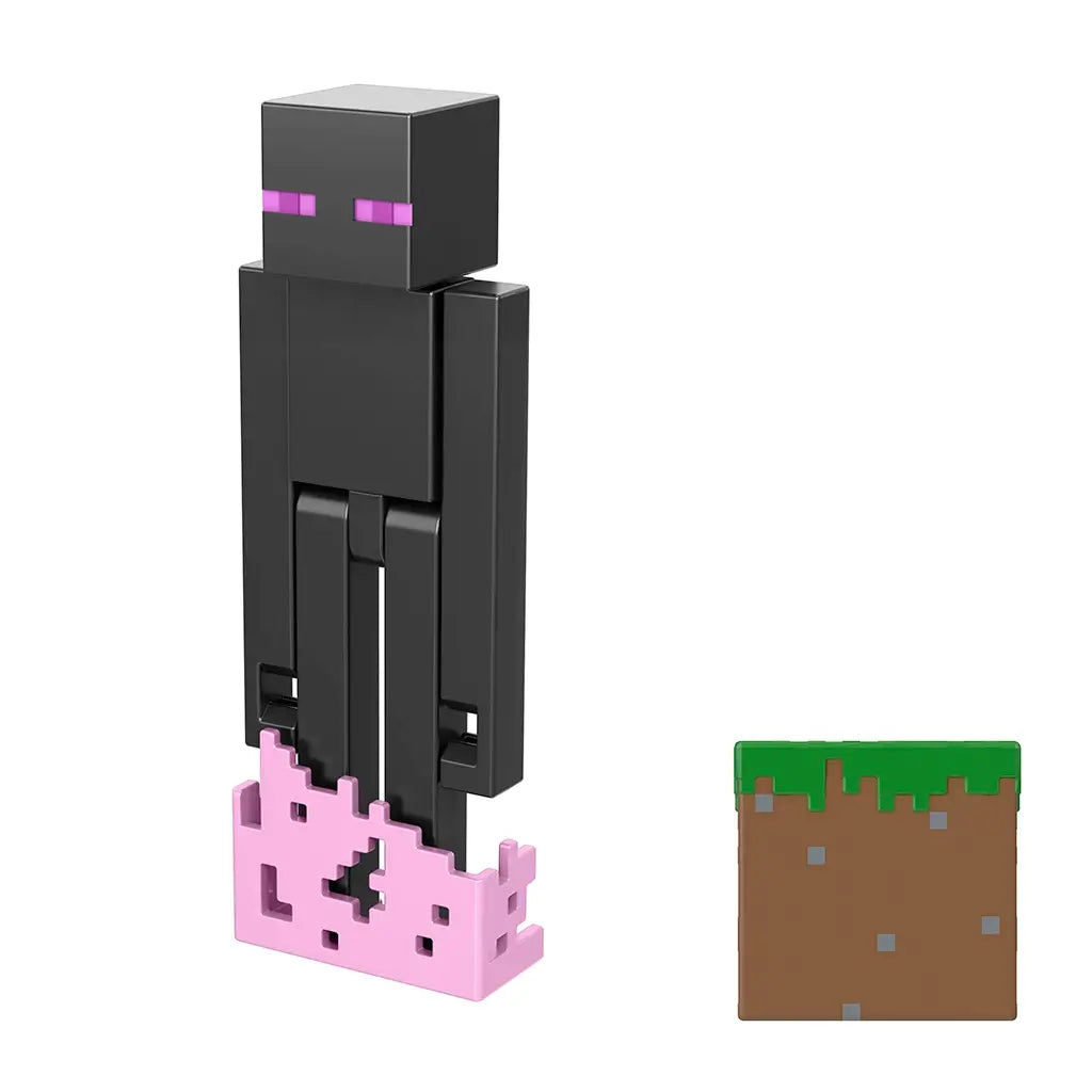 Close-up angled view of Minecraft Enderman action figure with pixelated design, pink teleportation base, and grass block accessory.