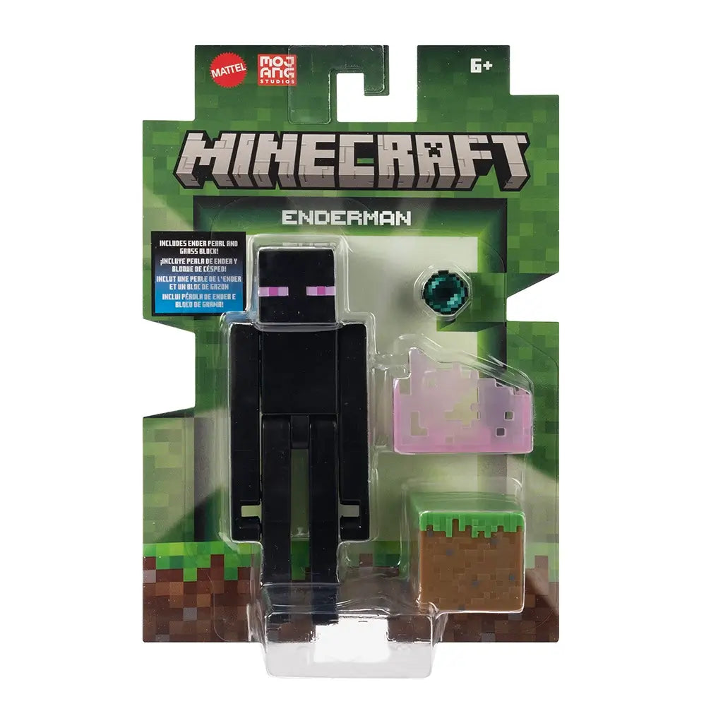 Minecraft Enderman action figure in retail packaging, includes Ender Pearl, pink teleportation effect base, and grass block accessory.