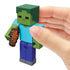 Hand holding Minecraft Zombie 3.25-inch action figure with pixelated design, holding rotten flesh accessory for roleplay fun.