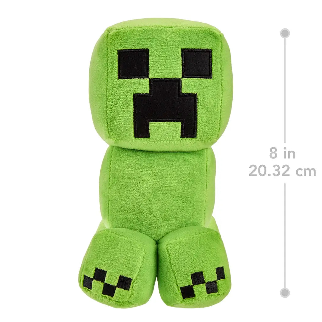 Minecraft Creeper plush toy in bright green fabric with soft texture, block-shaped head and body, black pixel face, shown with on-image size graphic indicating approximately 8 inches or 20.32 centimeters tall.