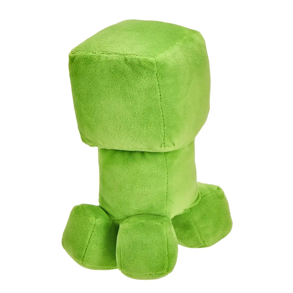 Rear view of Minecraft Creeper plush toy in bright green fuzzy fabric, showing smooth block-shaped head and body, stitched seams, four short legs, and simple back profile on white background.