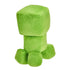 Rear view of Minecraft Creeper plush toy in bright green fuzzy fabric, showing smooth block-shaped head and body, stitched seams, four short legs, and simple back profile on white background.