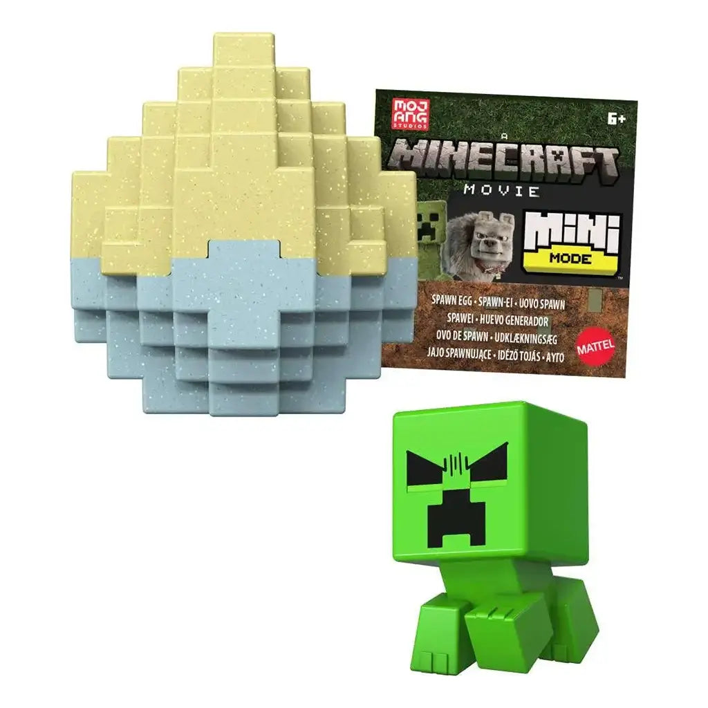 Minecraft Movie Mini Mode toy set featuring a green Creeper figure, a pixelated blue-and-yellow spawn egg container, and branded packaging by Mattel, designed for kids aged 6 and older.