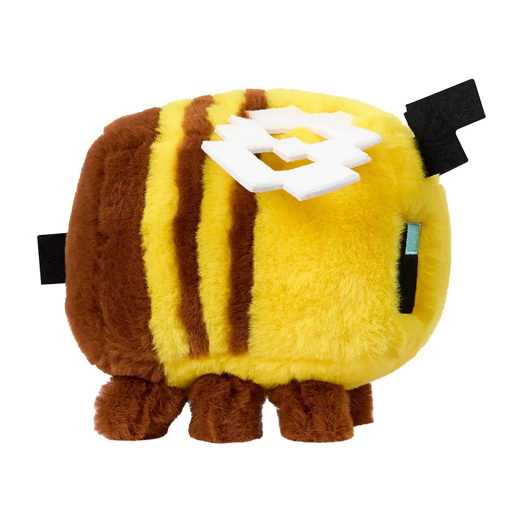 Side profile of Minecraft bee plush toy in bright yellow and brown colors, with striped body, black antennae, and geometric white wings made of felt material.