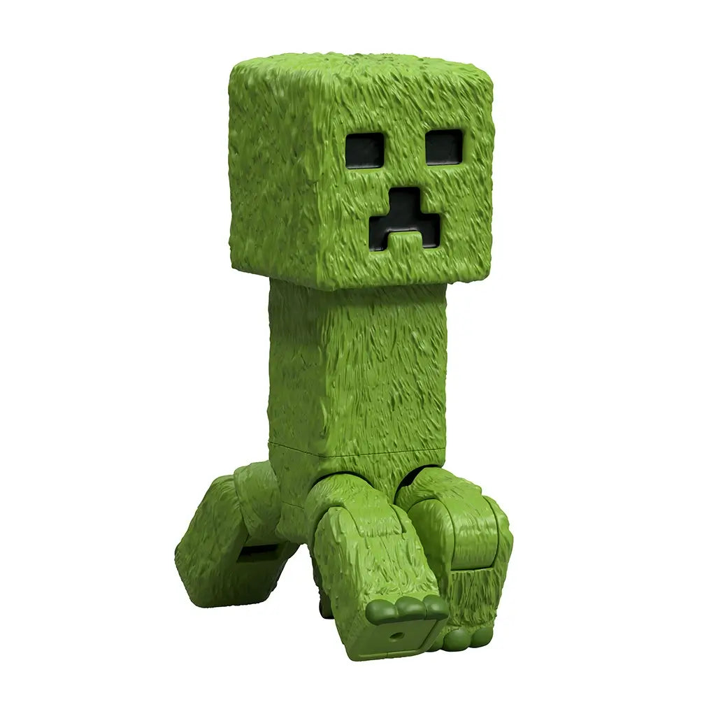 Close view of Minecraft Creeper figure in textured green plastic with square head, pixelated black facial features, and articulated legs positioned for display.