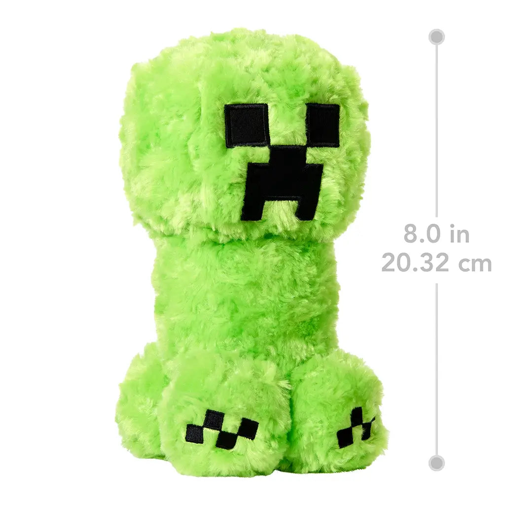 Minecraft Creeper plush toy, green fuzzy fabric with pixel face, displayed upright with measurement overlay showing 8 inches (20.32 cm) in height.