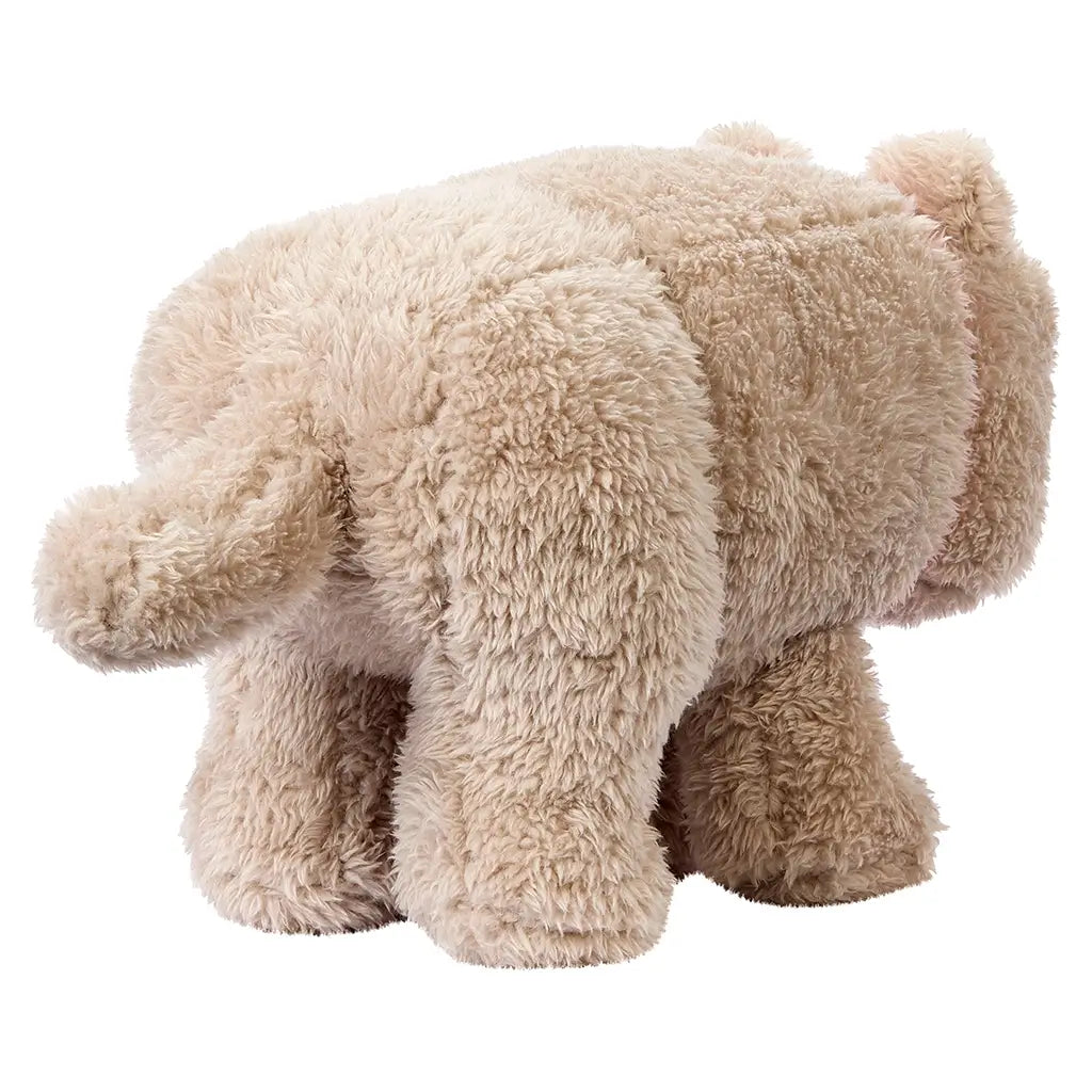 Back angled view of Minecraft Dennis plush wolf, showing beige fluffy texture, short blocky tail, squared legs, and rounded cube-like body in signature pixelated Minecraft style.