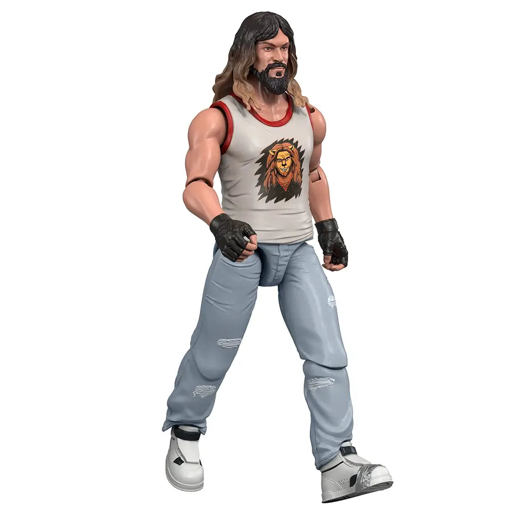 Minecraft Movie Garrett action figure left angled view highlights muscular arms, fingerless gloves, sleeveless lion tank top, ripped jeans, and articulated joints, showcasing detailed sculpting and poseability from the side.