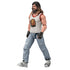 Minecraft Movie Garrett action figure right angled view shows long hair sculpt, beard detail, lion chest graphic, textured jeans, and sneaker footwear, emphasizing realistic proportions and side profile design.