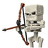 Close-up of Minecraft Movie Skeleton toy posed with blocky brown bow in hand, showcasing articulated arms, square skull, and pixel-style details.