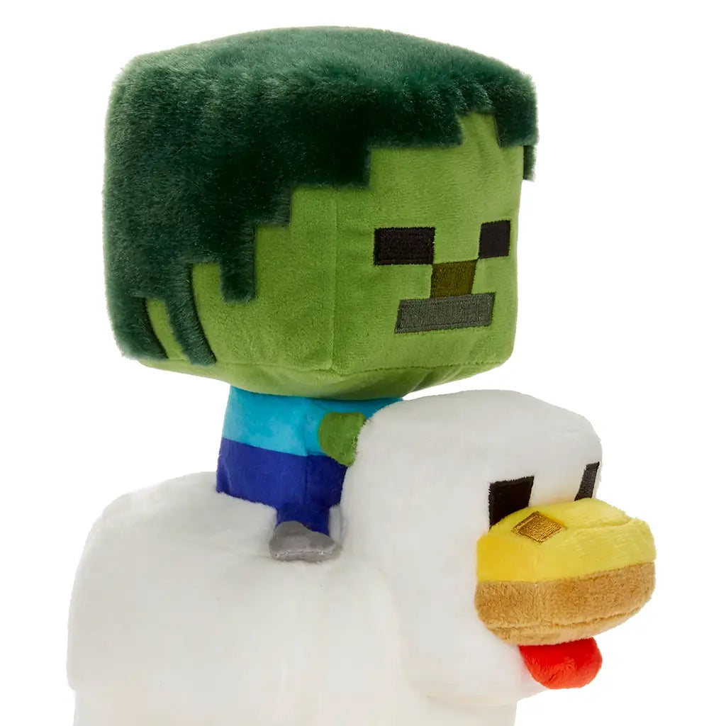 Minecraft Zombie Chicken Jockey plush close-up showing green pixelated zombie face with embroidered eyes and mouth, velvety fabric texture, and block-style head resting above the plush chicken character.