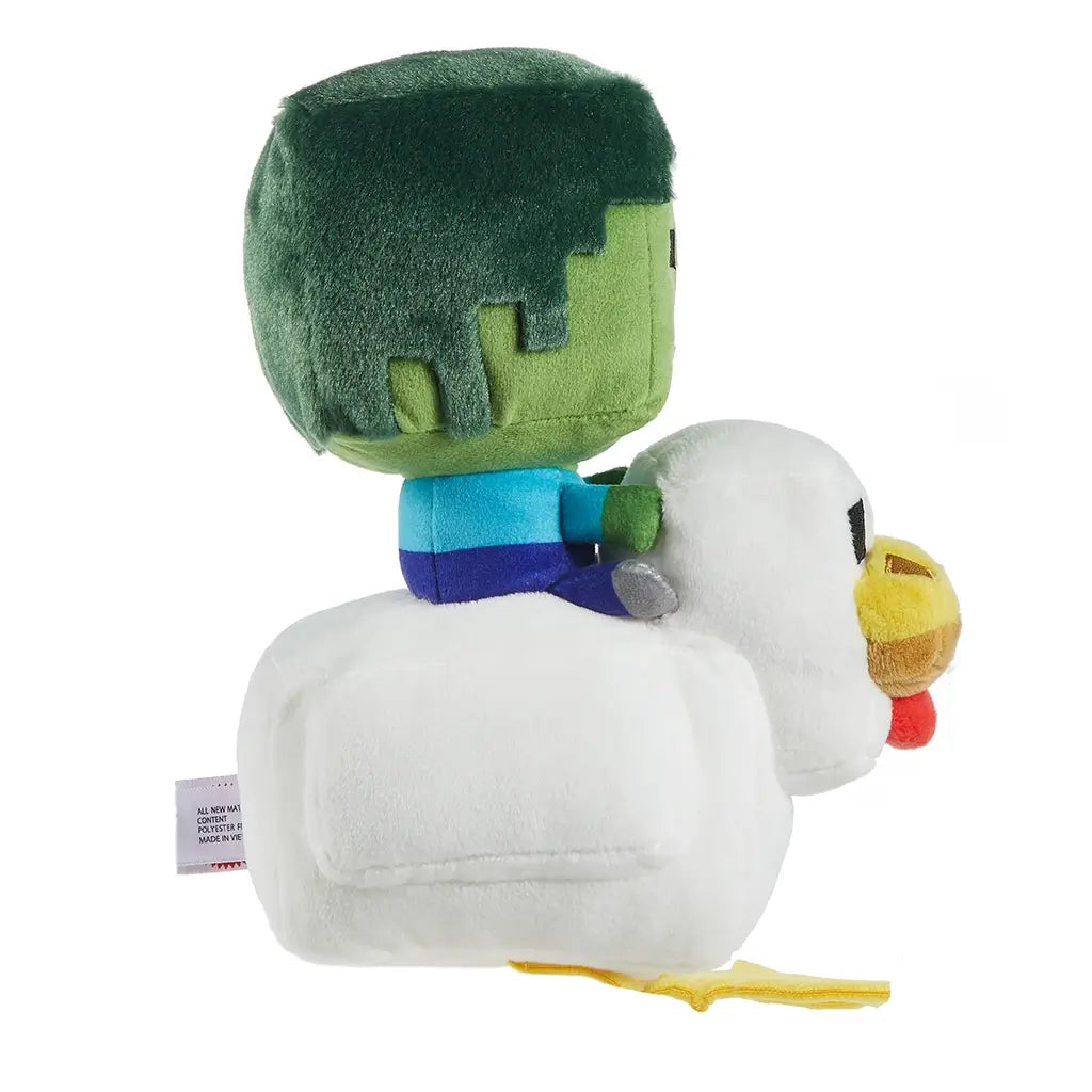 Minecraft Zombie Chicken Jockey plush left side view displaying layered green zombie head, blue shirt detail, white chicken body, yellow felt feet, and soft rounded construction inspired by the game.