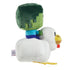 Minecraft Zombie Chicken Jockey plush left side view displaying layered green zombie head, blue shirt detail, white chicken body, yellow felt feet, and soft rounded construction inspired by the game.