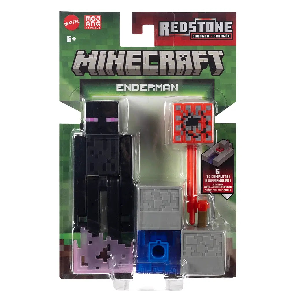 Minecraft Redstone Charged Enderman retail packaging with clear blister, displaying the Enderman figure, TNT hammer accessory, purple effect base, redstone charger blocks, Minecraft branding, and Mojang Studios logos on a green card front.