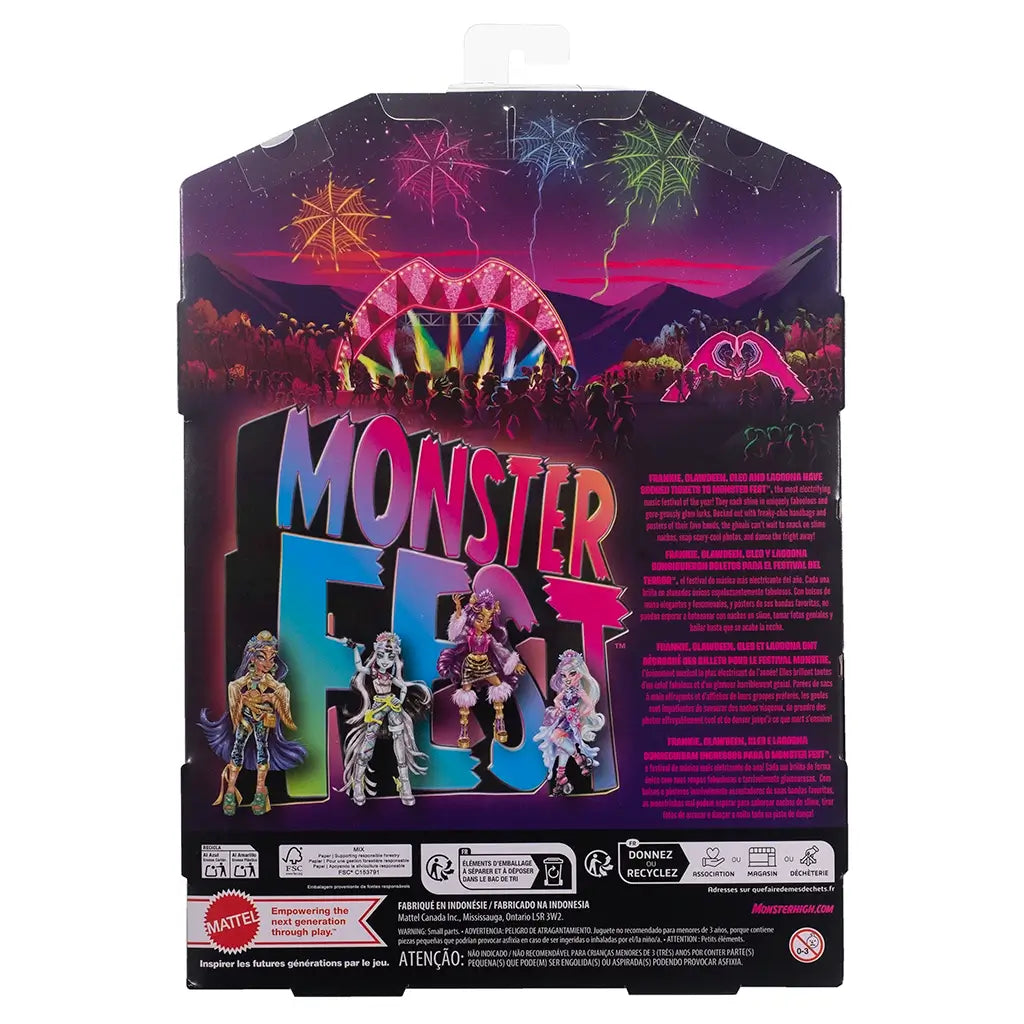 Back of Monster High Frankie Stein festival doll box showing neon stage artwork, fireworks, and additional Monster Fest characters against a dark mountain background.
