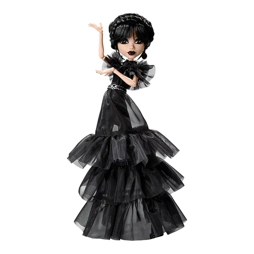 Monster High Rave N’ Wednesday doll striking a dance pose in her tiered ruffled black gown, braided hair, and silver skull belt, blending gothic style with playful character flair.