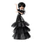 Monster High Rave N’ Wednesday doll striking a dance pose in her tiered ruffled black gown, braided hair, and silver skull belt, blending gothic style with playful character flair.