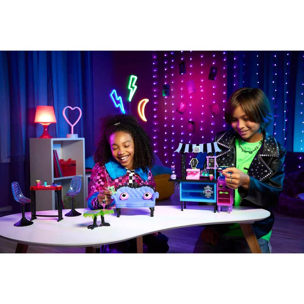 Kids playing with the Monster High The Coffin Bean Cafe Playset