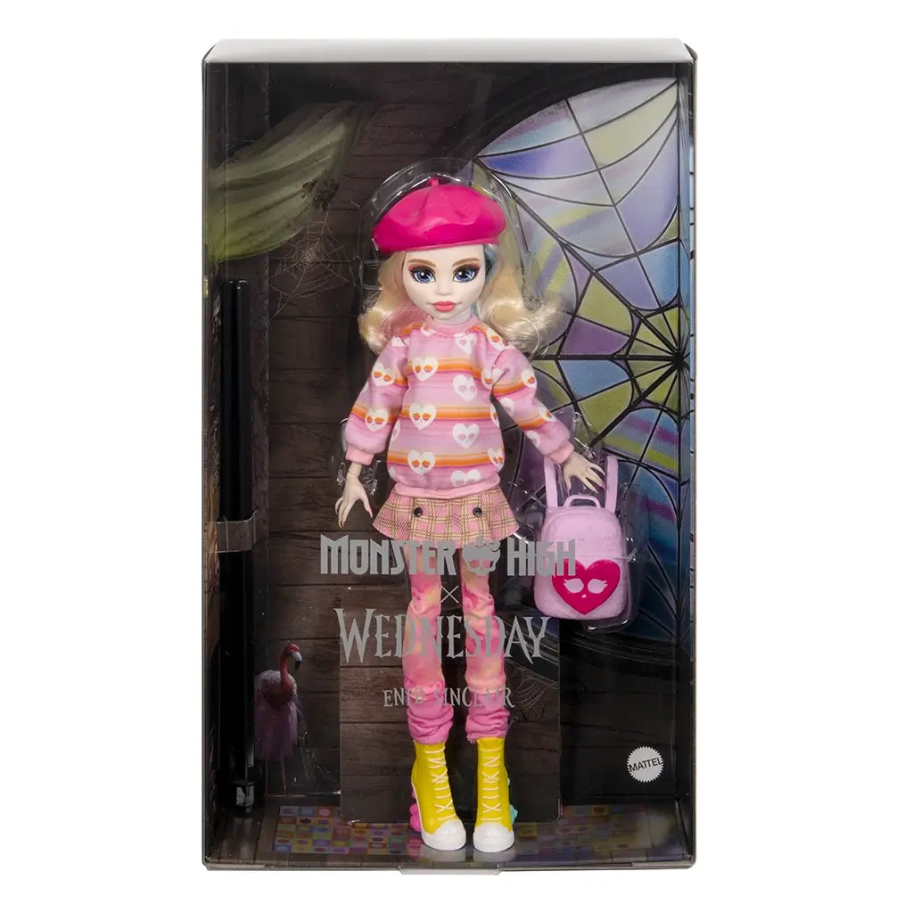 Monster High Enid Sinclair doll packaged in window box with gothic stained-glass backdrop, wearing pink sweater, plaid skirt, yellow boots, and holding heart-print pink bag.