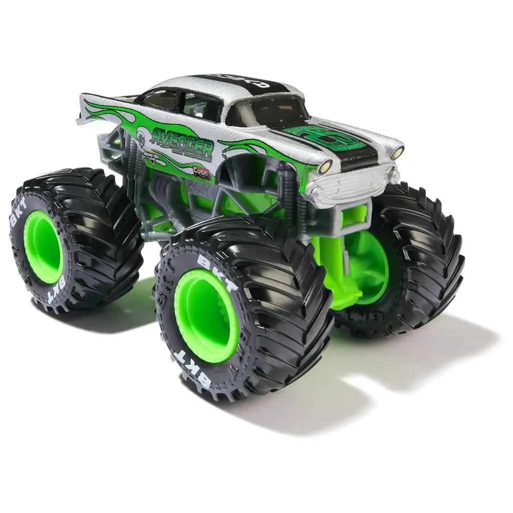 Monster Jam Avenger monster truck shown in silver, black, and bright green colors, with die-cast metal body, oversized BKT tires, flame graphics, and raised suspension, celebrating the Avenger 25th Anniversary in a compact 1:64 scale design.