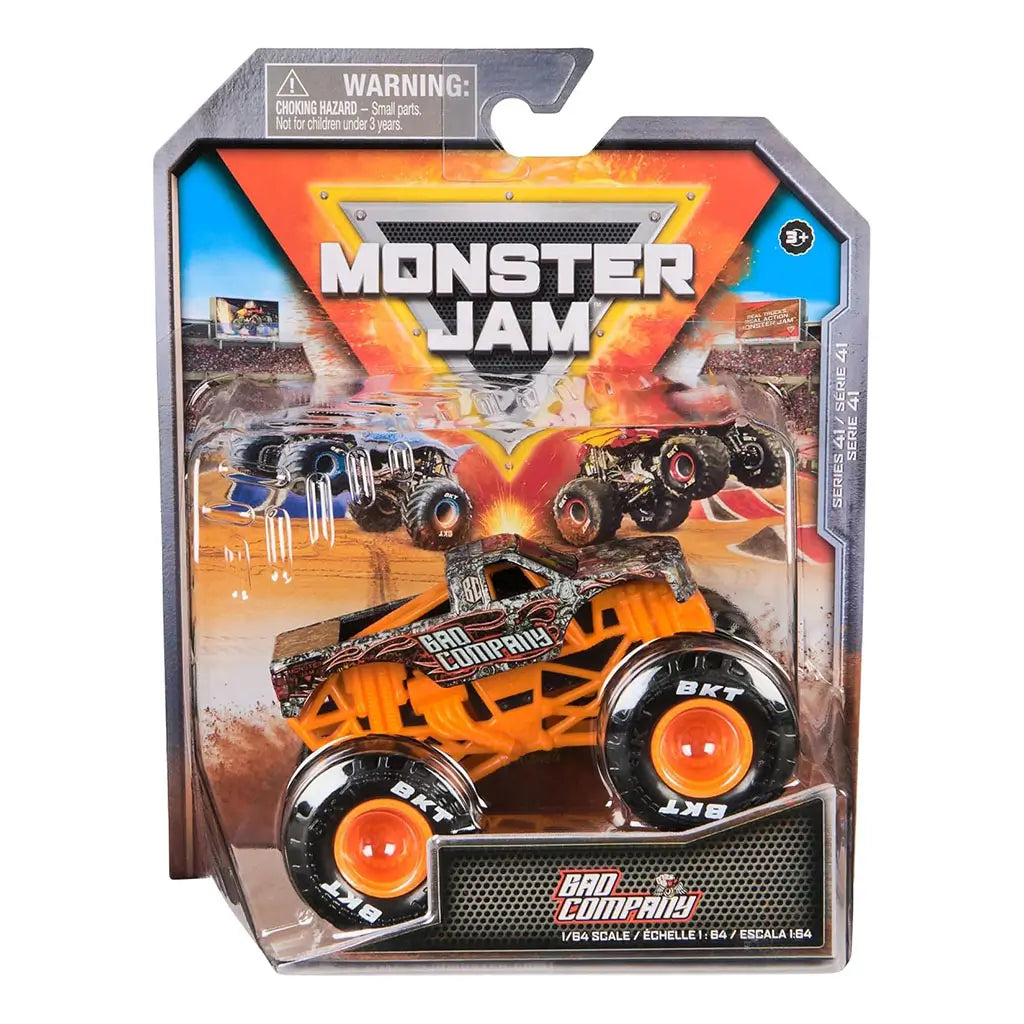 Monster Jam Bad Company 1:64 diecast monster truck in retail packaging, showing detailed body graphics, bold logo, orange chassis, and oversized black tires.
