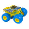 Monster Jam Blue Thunder toy truck in blue, yellow, and silver painted body with lightning graphics, oversized rubber tires with yellow rims, and lifted suspension, displayed on a clean white studio background.
