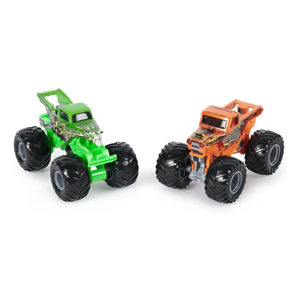 Set of two Monster Jam toy trucks, Bog Hog in orange and King Sling in green, both with oversized tires and colorful graphics, displayed side by side on a white background.